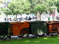 Carts await morning cleaning crews Ho Chi Minh City photo